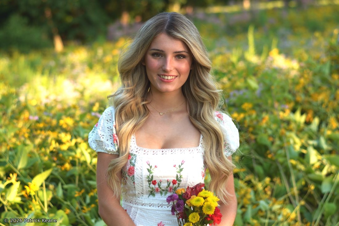 A portrait in a wildflower meadow